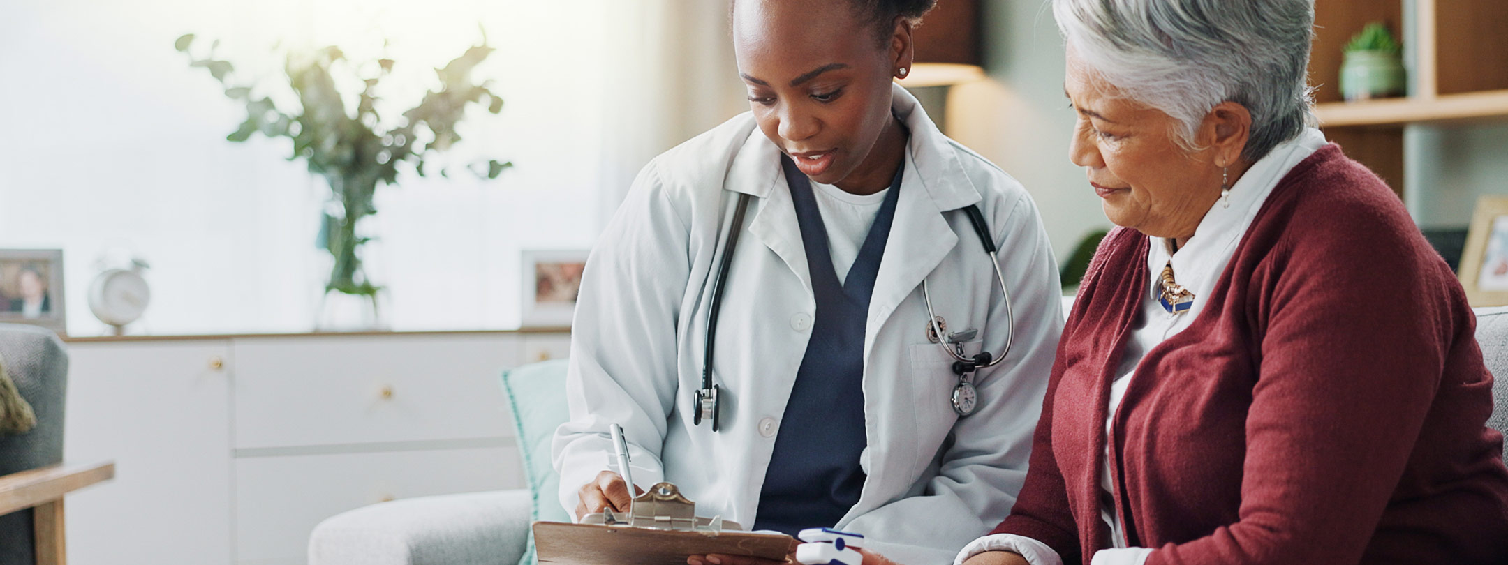 Doctor reviewing chart with patient